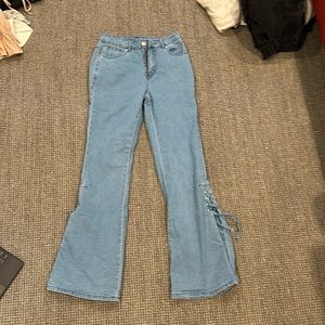 light blue demin jeans with crossover bell bottoms